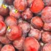 Fresh Plum cut open showing juicy flesh - Fruitlandbd