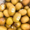 Fresh Gold Kiwi cut open showing golden flesh - Fruitlandbd